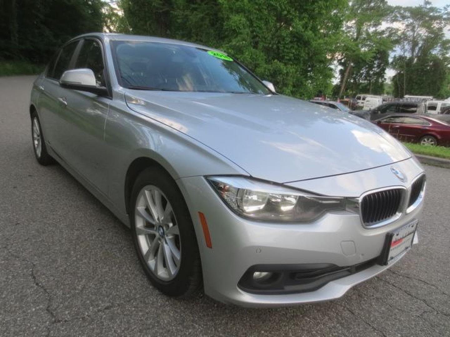 2016 Black /Black BMW 3-Series (WBA8E5G59GN) with an 2.0l 4cyl Turbo engine, Automatic transmission, located at 270 US Route 6, Mahopac, NY, 10541, (845) 621-0895, 41.349022, -73.755280 - Photo#1